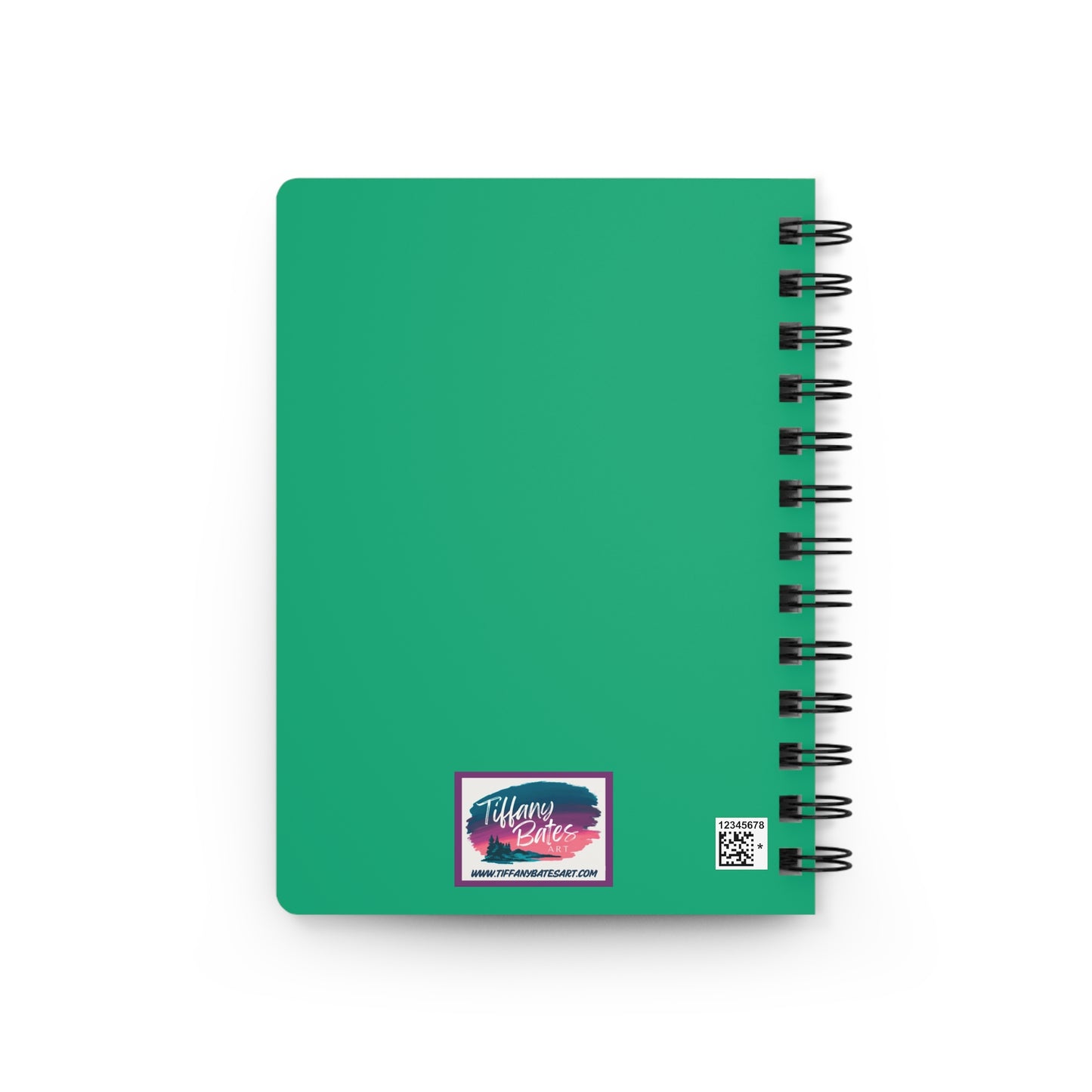 Green back cover of notebook with artist logo