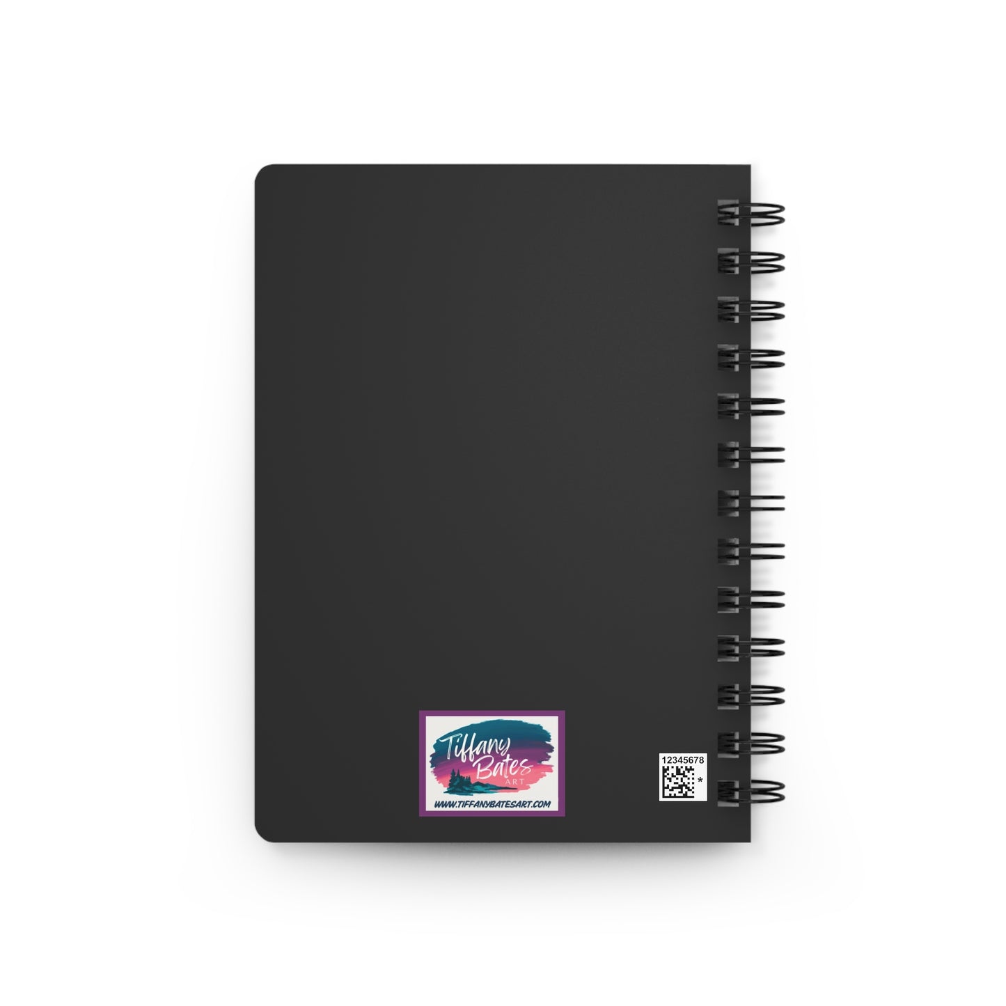 Dark grey back cover of notebook with artist logo