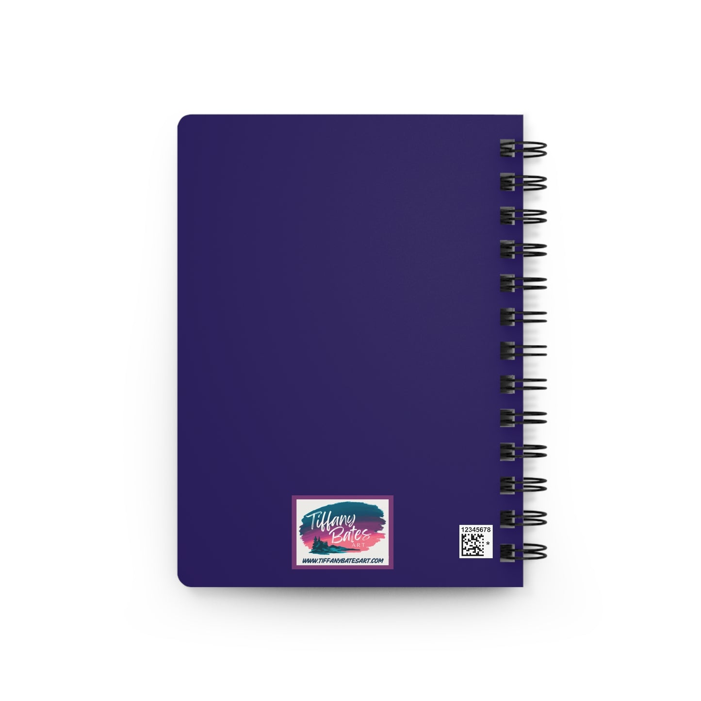 Back of notebook, purple cover with artist logo