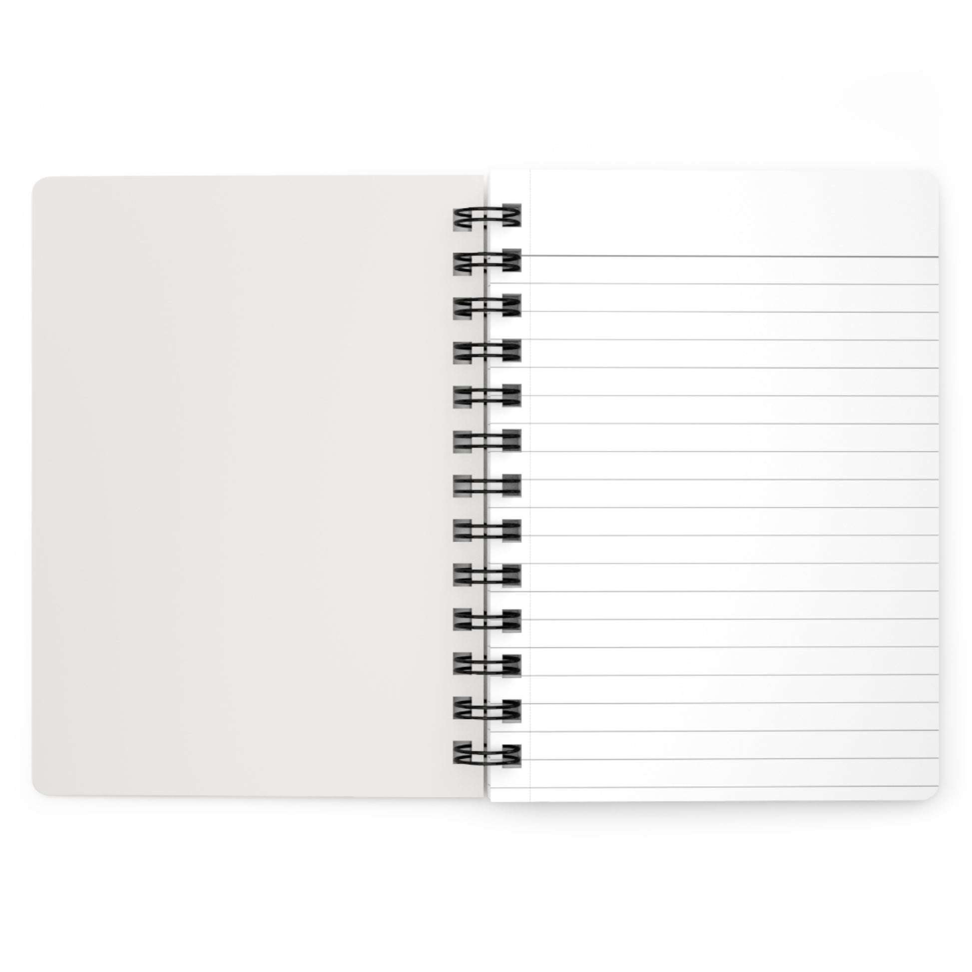 Open notebook with black binding showing white paper with lines