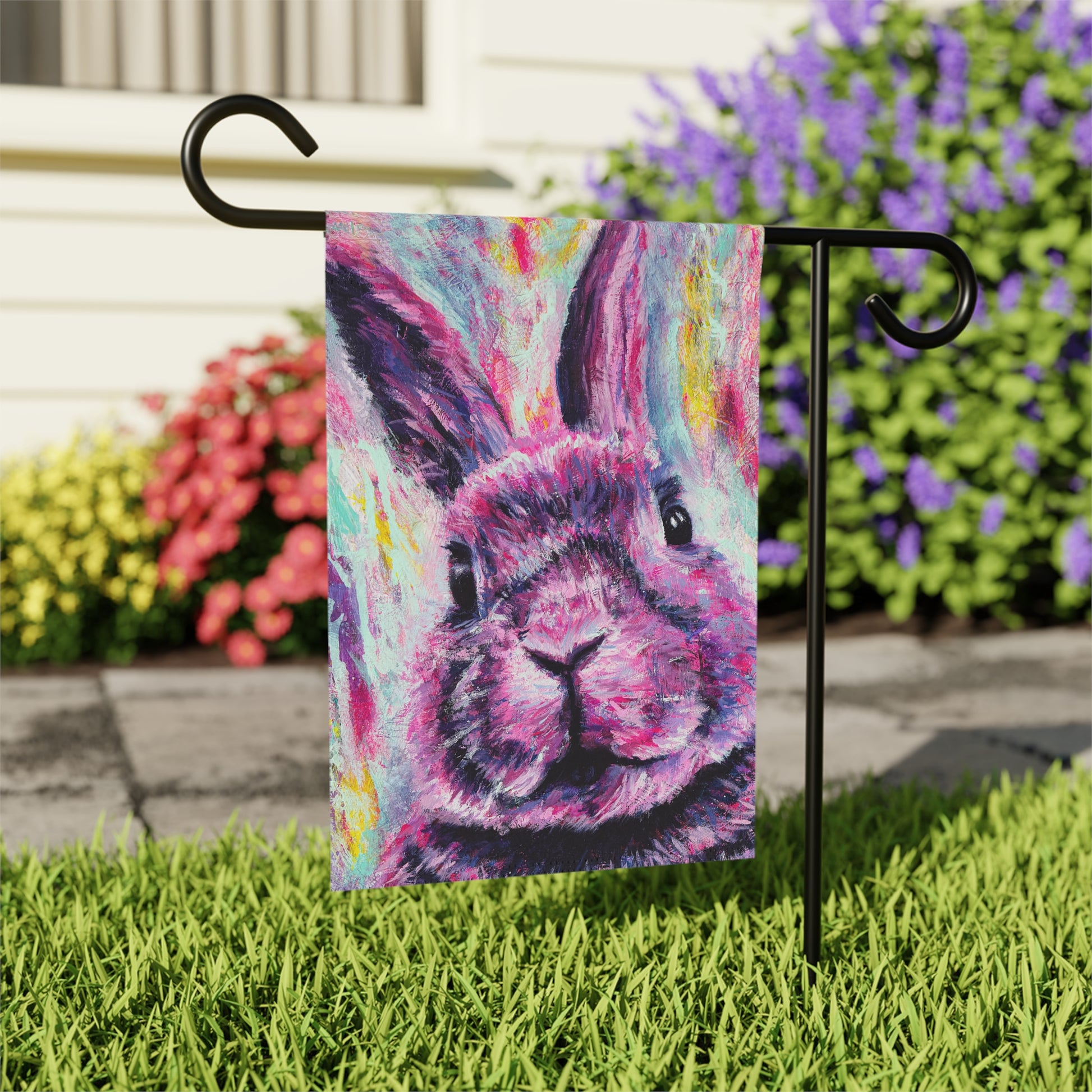 Decorative garden flag with a pink colorful rabbit painting design