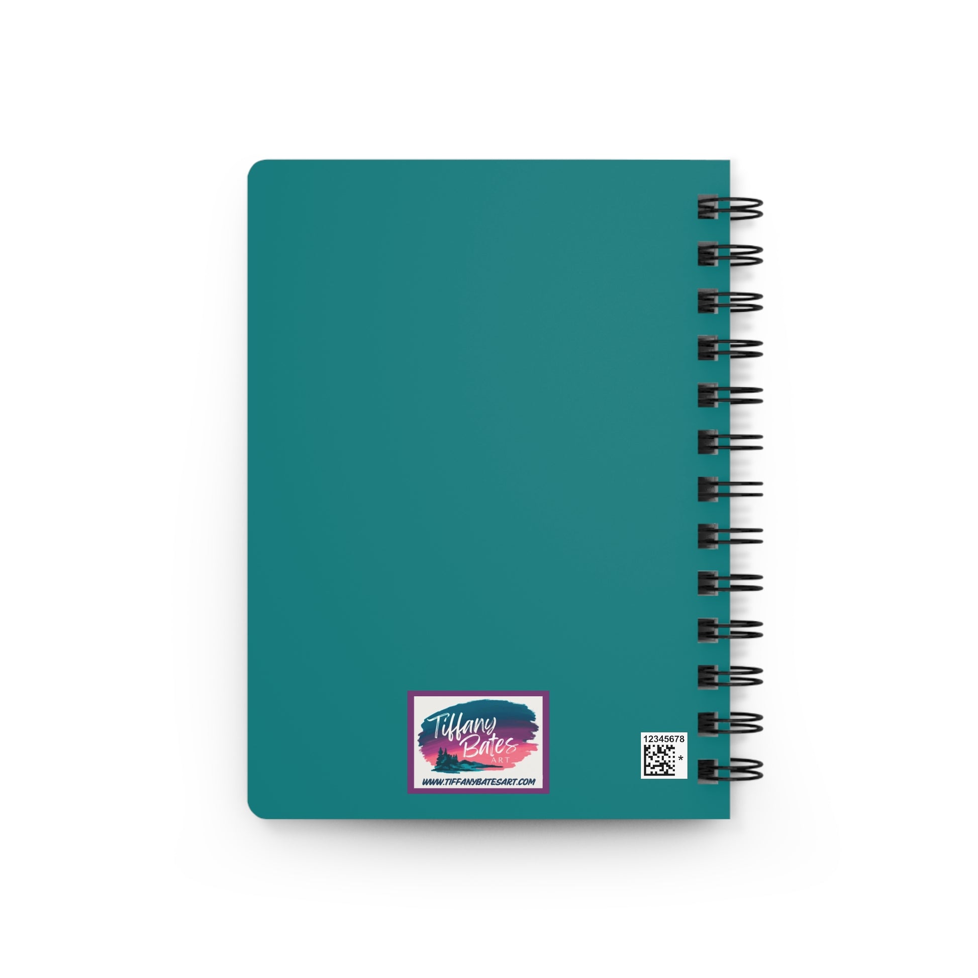 Green back cover of notebook with artist logo