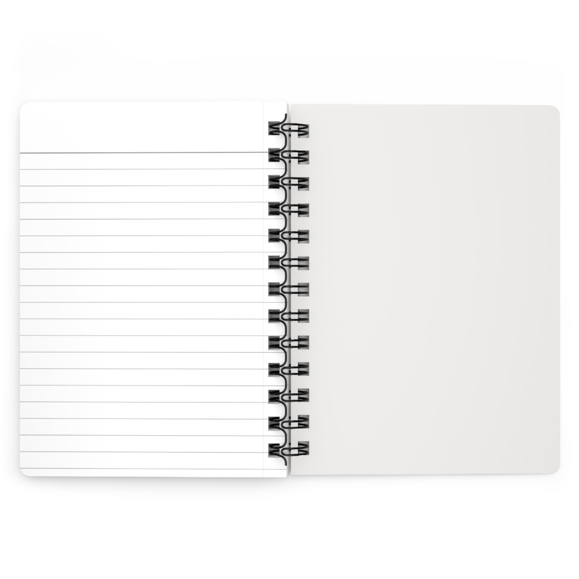 Open notebook with black binding showing white paper with lines
