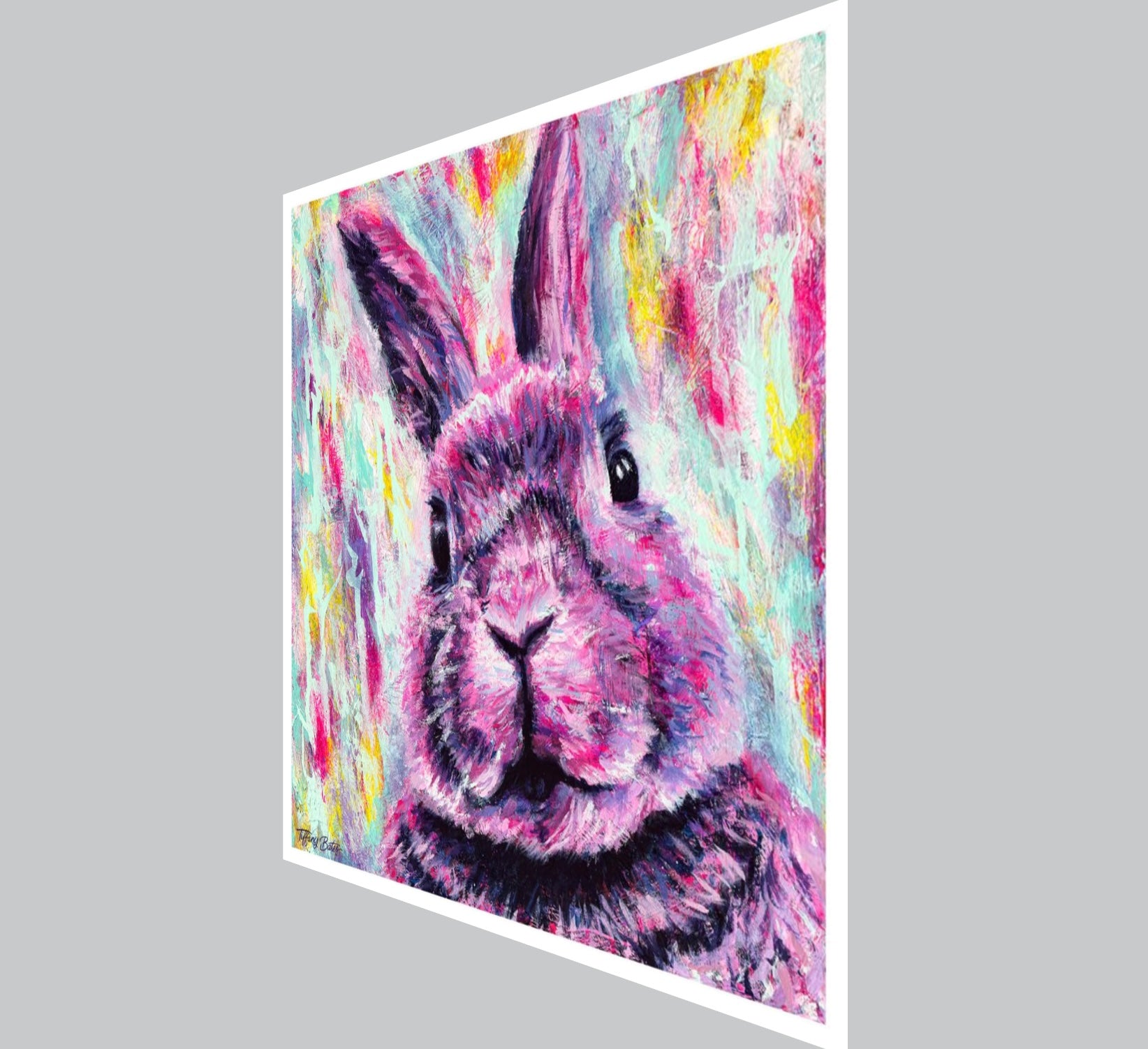 An angled view of Fine art print of a colorful vibrant oil painting depicting a hare with neon pink, prismatic purple, and deep indigo shades on a graffiti style background 