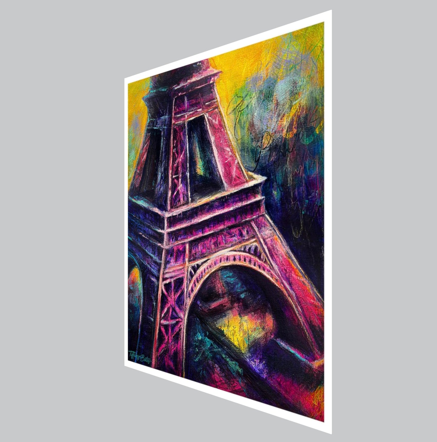 Angled view of A fine art print of A colorful artistic representation of the Eiffel Tower, featuring rich purples, twilight blues, passionate pinks, and glowing yellows.