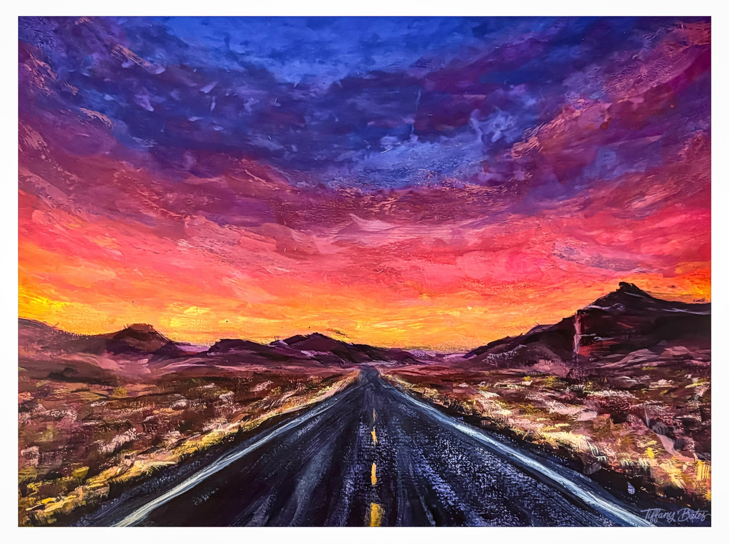 Original colorful vibrant gouache painting depicting a desert landscape at sunset with a road stretching towards the horizon.